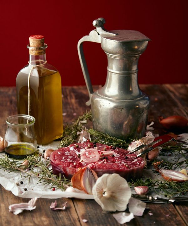 Food: onions, romero, meat steak, salt, pepper, garlic, olive oil,fork, sauses